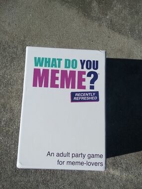 Meme What Do You Meme? Party Card Game - White with Teal, Purple, and Pink Text